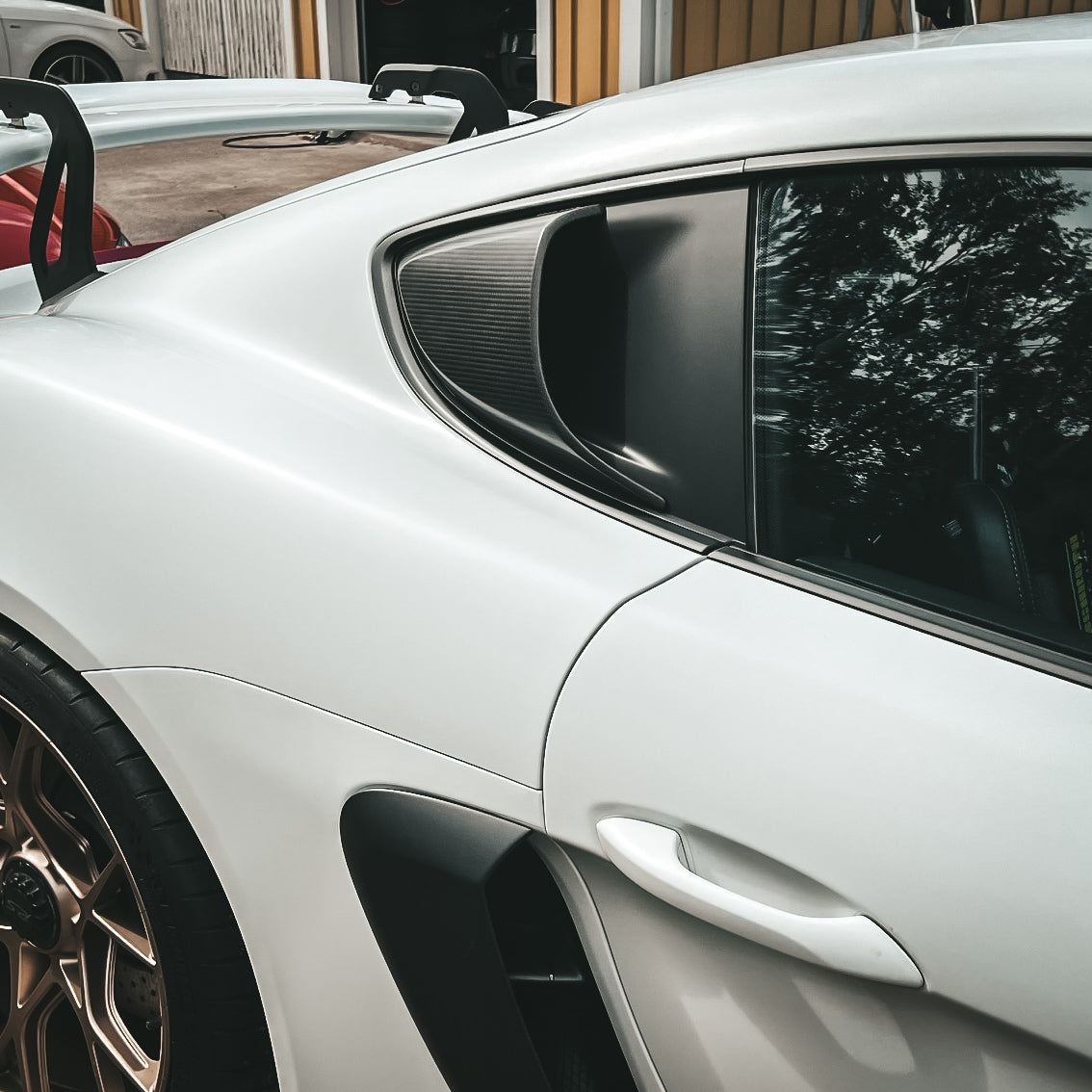 Porsche Cayman GT4 RS Style Carbon Fiber AIR SCOOP Set - Gold Leaf Performance designs premium performance components for high-end vehicles. With expertise in advanced materials and motorsports engineering, we craft aerodynamically optimized parts that enhance both performance and aesthetics. Every product is meticulously crafted to ensure a perfect OEM+ fit and an exceptional driving experience.